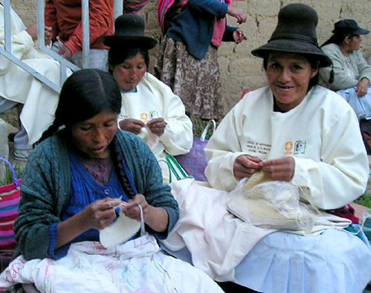 Indigenous Designs, Peruvian knitwear Indigenous Designs, Fair trade Indigenous Designs, organic cotton knits Indigenous Designs, Ruffled cardigan by Indigenous designs, hand knit fair trade designs, organic cotton handspun, Peruvian organic cotton