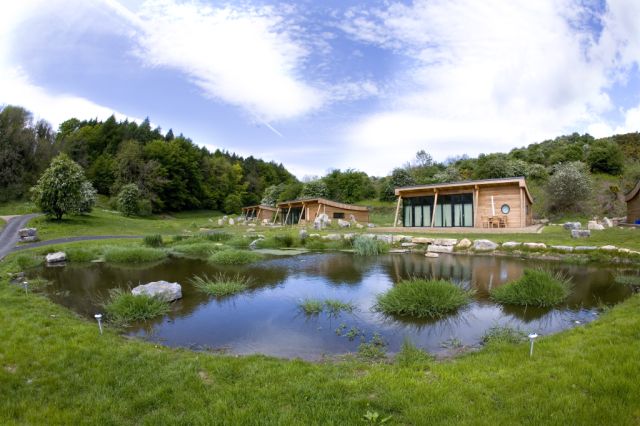 Natural Retreats eco-lodges, eco-travel in UK, UK National Parks, Lake District National Park, North York Moors National Park, Yorkshire Dales National Park, eco-getaways in the UK, Residence next to pond